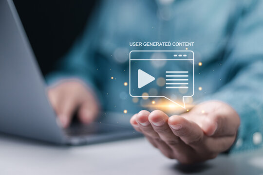 UGC, User generated content concept. Online marketing, Product reviews from the perspective of real users. Businessman use laptop with UGC icon on virtual screen.