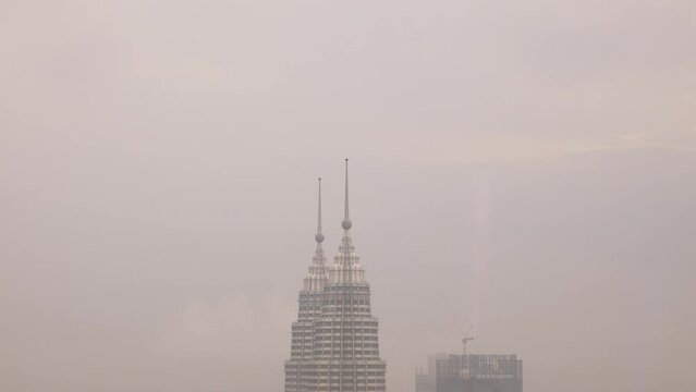 View of the Petronas Twin Towers, the tallest twin buildings in the world in Kuala Lumpur, Malaysia skyline