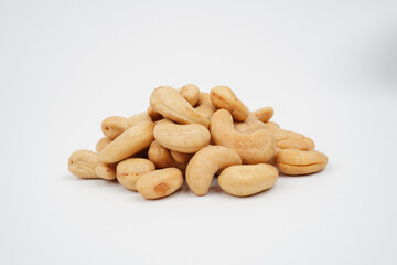 Heap of delicious cashew nuts isolated background