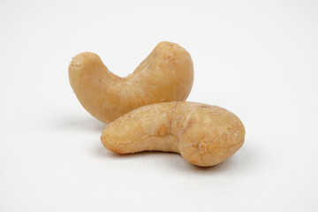 Closeup of two cashew nuts isolated background isolated background