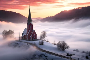 Sierkussen Catholic Church against the backdrop of sunrise and morning fog in the mountains. religion and christianity © photosaint