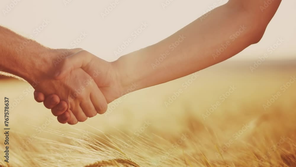 Sticker handshake contract farmers. agriculture business concept. two farmers shaking hands in a yellow wheat field signing a contract agreement. agriculture handshake lifestyle business agreement close-up