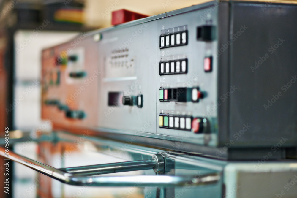 Poster factory, production and technology of machine closeup on system at manufacturing warehouse. industri