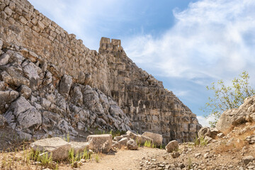 Remains  of fortress wall near secret exit to the ruins of the medieval fortress of Nimrod - Qalaat al-Subeiba, located near the border with Syria and Lebanon in the Golan Heights, in northern Israel