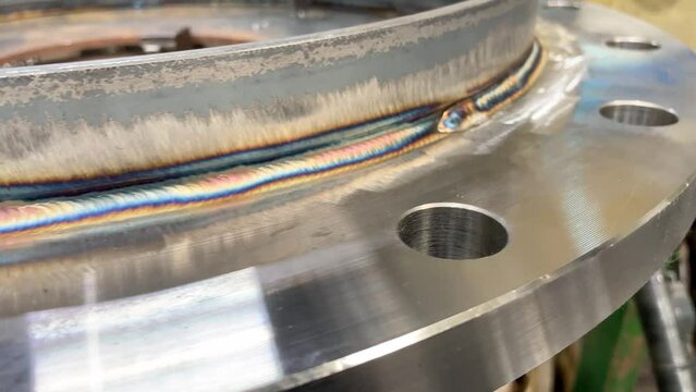 Welding seam on a pipeline close-up.