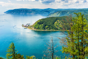 Beautiful summer panoramic landscape with view from Chersky stone to lake Baikal shore and Angara...