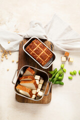 Soy food. Baked tofu cheese on a board, soybeans. Vegan product