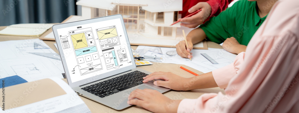 Poster cropped image of interior designer team discuss the material color while laptop displayed website wi