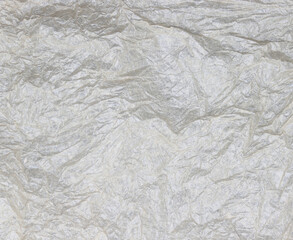 A blank sheet of paper or a crumpled notepad page background