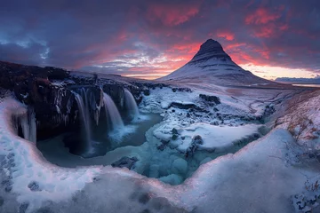 Papier Peint photo Lavable Kirkjufell A mountain with a waterfall and a lake in front of it