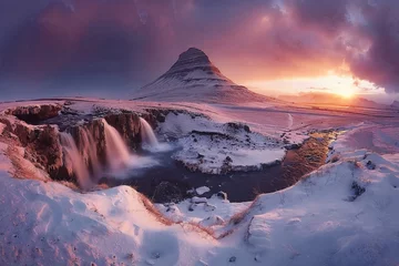 Fototapete Kirkjufell A mountain with a waterfall and a snow-covered valley