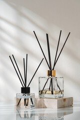 Elegant Aroma Diffusers on Marble Base in a Serene Indoor Setting