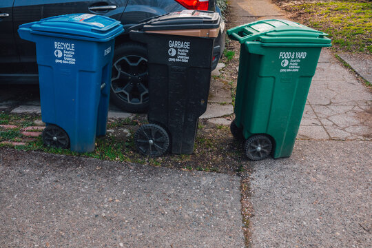 Seattle Public Utilities bins for recycling, garbage, food and yard waste