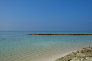 Mathiveri is one of the westernmost islands in the Maldives, beautiful beach scene with crystal clear blue water.