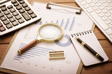 Office supplies placed on data sheets - financial work scenarios