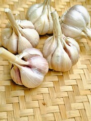garlic with a bamboo woven background
