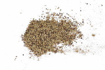 Spice of black pepper isolated. Ground black pepper flakes isolated. Heap of ground black pepper