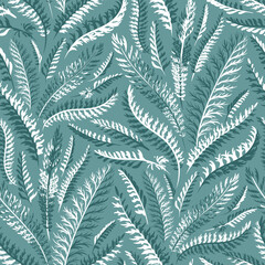 Seamless floral pattern with green and white leaves isolated on the green background. Flat template.
