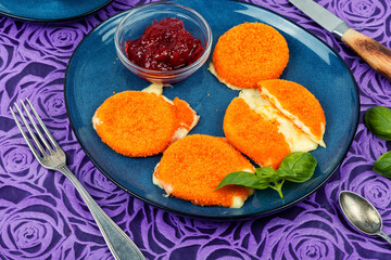 Baked Camembert cheese with berry sauce