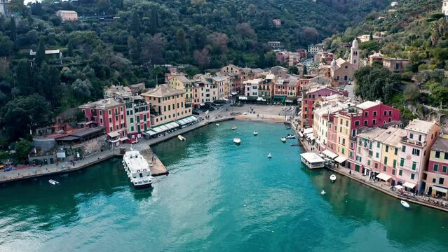 Scenic architecture around Portofino harbor on Ligurian coastline, Italy. Drone