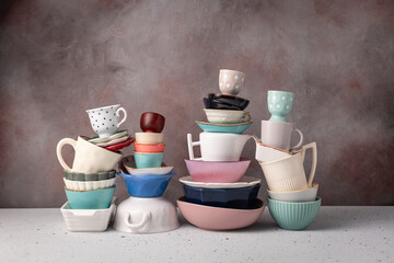 Stack of Varied Tableware and Teacups