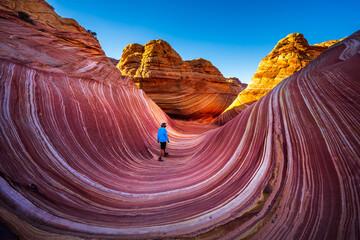 Man Hiking at The Wave in Coyote Buttes Arizona