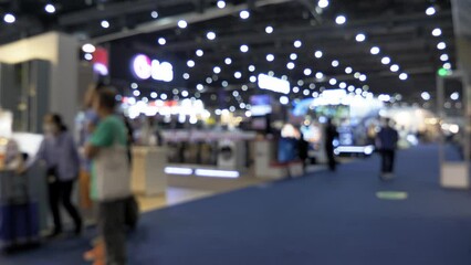 Abstract blur people in home and gardening market fair event background. Exhibition tradeshow business concept. Defocus Interia decoration in Home and Garden Exhibition 2024 Show in Bangkok, Thailand