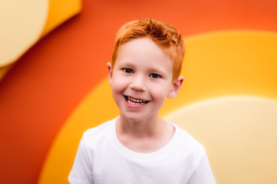 Smiling young boy  with colorful  background