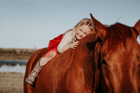 Blonde Charm: 4-Year-Old Girl and Her Horse Forge Unbreakable Bond!