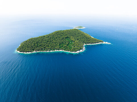 Aerial view of Dassia Island near the coast of Skopelos in Greece
