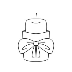 A candle with a bow around it