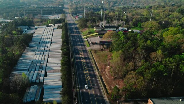 Overview aerial of parking lot of semi trailers in South Atlana, Georgia.