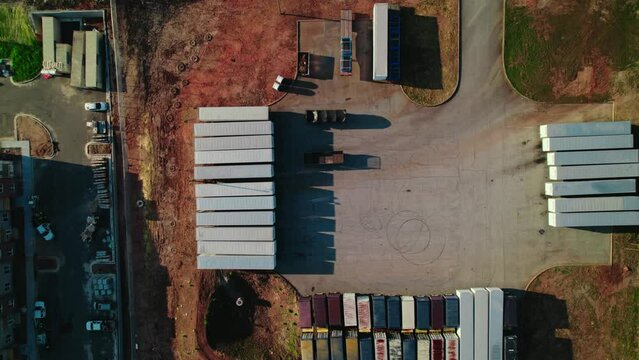 Top down aerial of parking lot of semi trailers in South Atlana, Georgia.