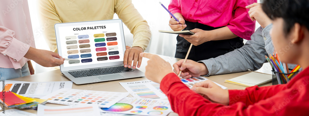 Poster a portrait of creativity graphic designer team select appropriate color for the project by using lap