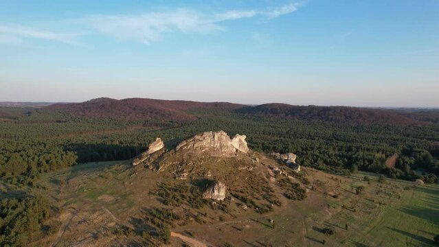 Dronie Shot of Expansive Forested Landscape with Prominent Rock Formations, Biaklo, Little Giewont, Poland, Czestochowa, Olsztyn Jurajski, polish jura, Polish Jurassic Highland