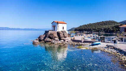 The little church of Panagia gorgona situated on a rock in Skala Sykamias, a picturesque seaside...