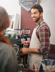 Happy man, waiter and talking to customer in coffee shop with machine for order, service or...