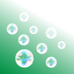 Soap bubbles in rainbow colors on a green gradient background.