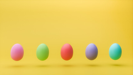 Colorful candy Easter eggs against a bright yellow background. 