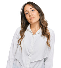 Young brunette woman wearing casual clothes relaxed with serious expression on face. simple and natural looking at the camera.