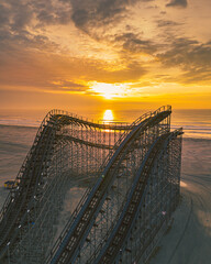 Scenic view of sunrise over the rollercoaster on the beach in Wildwood, New Jersey