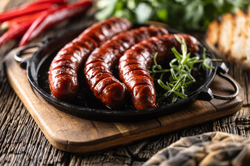 Sausages fried with spices bbq sauce and herbs - Close up - 767745818