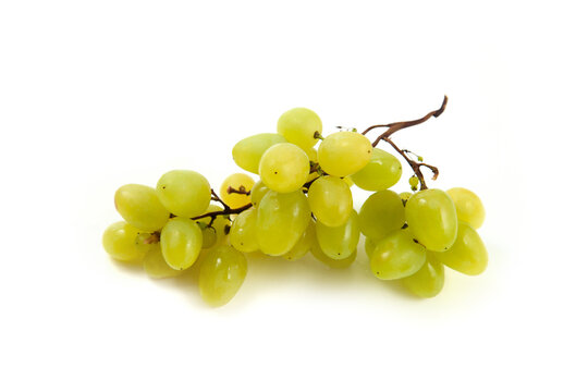 Bunch of organic green grapes isolated on white background.