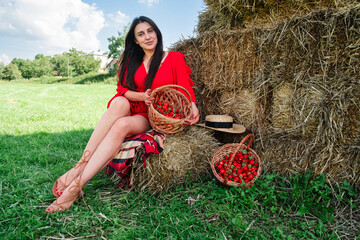Portrait of Smiling Woman with Basket of Strawberries