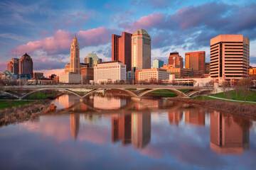 Columbus, Ohio, USA. Cityscape image of Columbus, Ohio, USA downtown skyline with the reflection of the city in the Scioto River at spring sunset. - 767751028