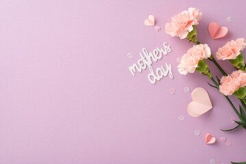 Mother's Day fashionable layout: Overhead shot of fresh carnations, sentimental message, tiny...