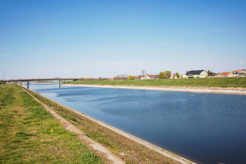 Calm idyllic spring sunny day on river Novi Sad Serbia - obrazy, fototapety, plakaty