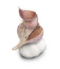 Stacked heads and cloves of garlic on beige background