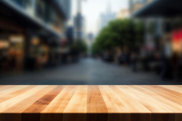 An empty wooden table in front of a blurred city street. High quality photo - obrazy, fototapety, plakaty