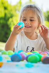 Happy Baby Coloring Easter Eggs - 767786652